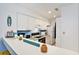 Efficient kitchen featuring white cabinets and modern appliances, open to the dining area at 209 75Th Ave N # T-8, Myrtle Beach, SC 29572