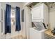 Practical laundry area with a stacked washer and dryer unit, maximizing space at 209 75Th Ave N # T-8, Myrtle Beach, SC 29572