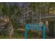 Ocean Dunes Villas I resort signage surrounded by lush landscaping and palm trees at 209 75Th Ave N # T-8, Myrtle Beach, SC 29572