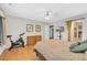 Bedroom showcasing hardwood floors, neutral walls, and an exercise bike at 215 Lander Dr., Conway, SC 29526