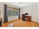 Bedroom with hardwood floors, ample natural light, and a dedicated workspace at 215 Lander Dr., Conway, SC 29526