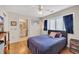 Bedroom with hardwood floors and attached bath creates a relaxing private retreat at 215 Lander Dr., Conway, SC 29526