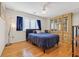 Bedroom has natural light, with an included armoire and hardwood floors at 215 Lander Dr., Conway, SC 29526