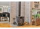 Living room with a wood burning stove and light brick surround adds to the cozy atmosphere at 215 Lander Dr., Conway, SC 29526