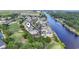 Aerial view of condos nestled on a golf course with a beautiful waterfront view at 2180 Waterview Dr. # 1044, North Myrtle Beach, SC 29582