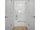 A bright, modern bathroom featuring a glass-enclosed shower and clean, white finishes at 2180 Waterview Dr. # 1044, North Myrtle Beach, SC 29582
