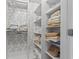 Organized linen closet featuring ample shelving space for towels and linens at 2180 Waterview Dr. # 1044, North Myrtle Beach, SC 29582