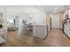Open-concept living room and kitchen area features hardwood flooring at 2180 Waterview Dr. # 1044, North Myrtle Beach, SC 29582