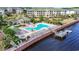 Beautiful waterfront community pool, with hot tub, lounge chairs, and views of the waterway at 2180 Waterview Dr. # 1044, North Myrtle Beach, SC 29582