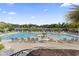 Inviting community pool with ample seating, perfect for relaxation and enjoying the serene surroundings at 2180 Waterview Dr. # 1044, North Myrtle Beach, SC 29582