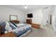 Bright bedroom with carpet, ceiling fan, TV and lots of natural light at 235 Welcome Dr., Myrtle Beach, SC 29579