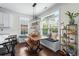 Cozy breakfast nook with bench seating, wood table, and backyard views at 235 Welcome Dr., Myrtle Beach, SC 29579