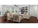Bright living room with a cozy fireplace, built-ins, and lots of light at 235 Welcome Dr., Myrtle Beach, SC 29579
