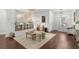 Inviting living room with accent rug and built-in shelving at 235 Welcome Dr., Myrtle Beach, SC 29579