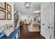 Bright, open concept living space with hardwood floors and staircase at 235 Welcome Dr., Myrtle Beach, SC 29579