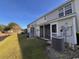Exterior of townhomes with back porches, central air, and a well-manicured lawn at 238 Seabert Rd. # 238, Myrtle Beach, SC 29579
