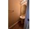 Small bathroom with oval mirror and a vessel sink at 238 Seabert Rd. # 238, Myrtle Beach, SC 29579