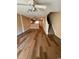Spacious living room featuring hardwood-style floors and stairs to the upper level at 238 Seabert Rd. # 238, Myrtle Beach, SC 29579