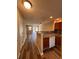 Comfortable living area with wood flooring, complemented by a cozy eat-in kitchen, offering a welcoming ambiance at 238 Seabert Rd. # 238, Myrtle Beach, SC 29579
