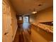 Open living room featuring wood floors, access to outdoor balcony, and neutral walls at 238 Seabert Rd. # 238, Myrtle Beach, SC 29579