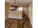 Inviting living room with wood floors open to the kitchen with granite countertops at 238 Seabert Rd. # 238, Myrtle Beach, SC 29579