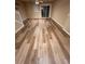Living room with hardwood style flooring and staircase at 238 Seabert Rd. # 238, Myrtle Beach, SC 29579