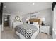 Comfortable bedroom featuring a cozy bed, classic decor, and plenty of natural light at 2615 Elowen Ln. # 109A, Longs, SC 29568