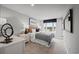 Well-lit bedroom with stylish decor, a comfortable bed, and scenic views at 2615 Elowen Ln. # 109A, Longs, SC 29568