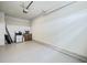 Spacious garage with ample room for storage, featuring clean painted floors at 2615 Elowen Ln. # 109A, Longs, SC 29568