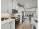 Modern kitchen with stainless steel appliances and white marble countertops at 2615 Elowen Ln. # 109A, Longs, SC 29568