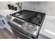 Close up of stainless steel gas range and marble countertops at 2615 Elowen Ln. # 109A, Longs, SC 29568