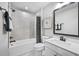 Well-lit bathroom featuring a shower-tub combination with modern fixtures and neutral design at 2616 Elowen Ln. # 167B, Longs, SC 29568