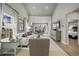 Spacious living room with an open layout, hardwood floors, and access to the rear patio area at 2616 Elowen Ln. # 167B, Longs, SC 29568
