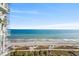 Breathtaking ocean view from a condo balcony overlooking the sandy beach and clear blue water at 2701 N Ocean Blvd. # 1260, Myrtle Beach, SC 29577