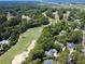 Expansive golf course community bordered by lush trees and waterway, an aerial view at 28 Torrens Pl., Pawleys Island, SC 29585