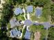 An aerial view of luxury homes arranged around a manicured cul-de-sac at 28 Torrens Pl., Pawleys Island, SC 29585