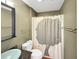 Stylish bathroom with a modern vessel sink and decorative shower curtain at 28 Torrens Pl., Pawleys Island, SC 29585