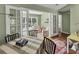 Light filled dining area with French doors overlooking backyard patio at 28 Torrens Pl., Pawleys Island, SC 29585