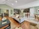 Open-concept living space with seamless flow between the kitchen, dining area, and comfortable seating, perfect for entertaining at 28 Torrens Pl., Pawleys Island, SC 29585