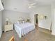 The main bedroom features a plush bed and is brightly lit with natural light at 28 Torrens Pl., Pawleys Island, SC 29585