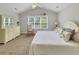Main bedroom with a plush bed, dresser, rocker, and window at 28 Torrens Pl., Pawleys Island, SC 29585