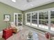 Bright sun room with plenty of natural light perfect for relaxing and reading at 28 Torrens Pl., Pawleys Island, SC 29585