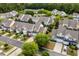 Aerial view of clustered homes in a peaceful, tree-lined neighborhood at 306 River Rock Ln. # 1306, Murrells Inlet, SC 29576