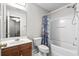 Bathroom featuring single sink, vanity, mirror and combination tub and shower at 306 River Rock Ln. # 1306, Murrells Inlet, SC 29576