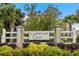 Entrance sign for Coldstream Cove at Prince Creek, surrounded by lush landscaping at 306 River Rock Ln. # 1306, Murrells Inlet, SC 29576