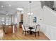 Bright dining area with hardwood floors and views of the kitchen at 306 River Rock Ln. # 1306, Murrells Inlet, SC 29576