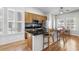 Charming kitchen features granite countertops, stainless appliances, and a cozy breakfast nook with natural light at 306 River Rock Ln. # 1306, Murrells Inlet, SC 29576