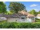 Well maintained backyard with lush greenery and white lattice, offering a private outdoor space at 3107 Robyn Ct., Little River, SC 29566