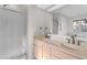 Bathroom featuring a double vanity and a walk-in shower at 3107 Robyn Ct., Little River, SC 29566