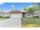 Charming single story home with a two-car garage and well maintained lawn in a desirable community at 3107 Robyn Ct., Little River, SC 29566